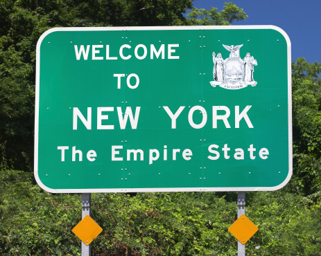 Roadside sign welcoming visitors to New York State