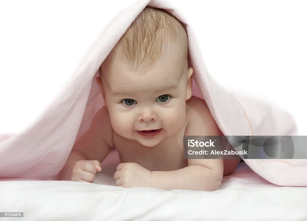 Charming baby Beautiful baby under pink blanket 0-11 Months Stock Photo