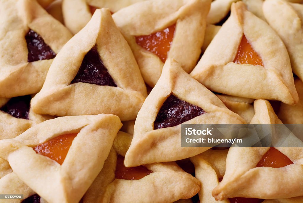 Close up of a pile of Hamantaschen Cookies Traditional hamantaschen cookies for the Jewish festival of Purim. Hamantaschen Stock Photo