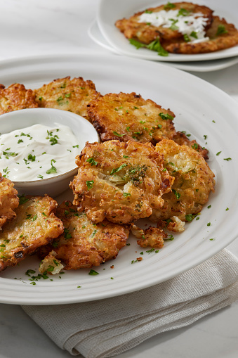 Crispy Onion Fritters with Scallions, Parsley and a Sour Cream Dip