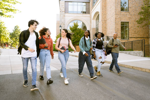 istock Group of diverse students arrive at University Campus 1771238515