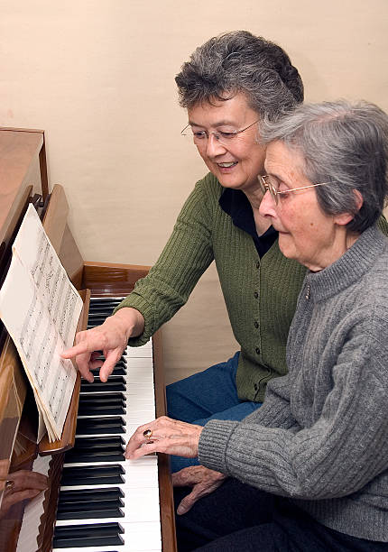 istock Grandma's piano lesson 177123887