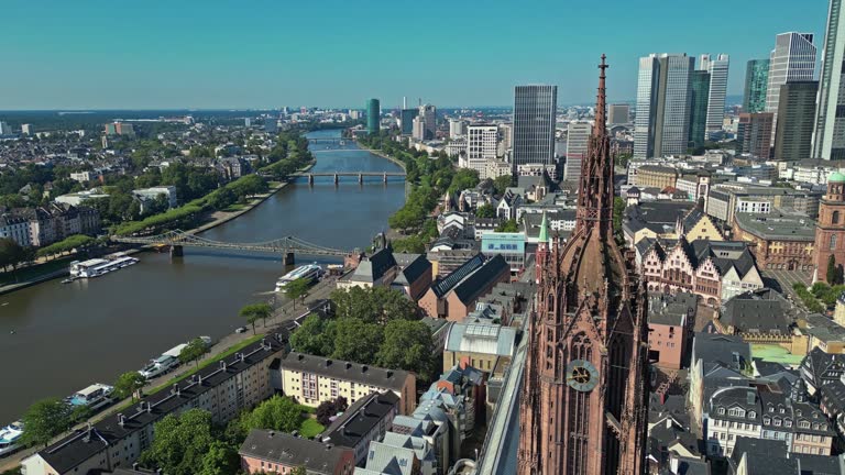 The impressive Church spire of the Frankfurt Cathedral. Aerial, rotate