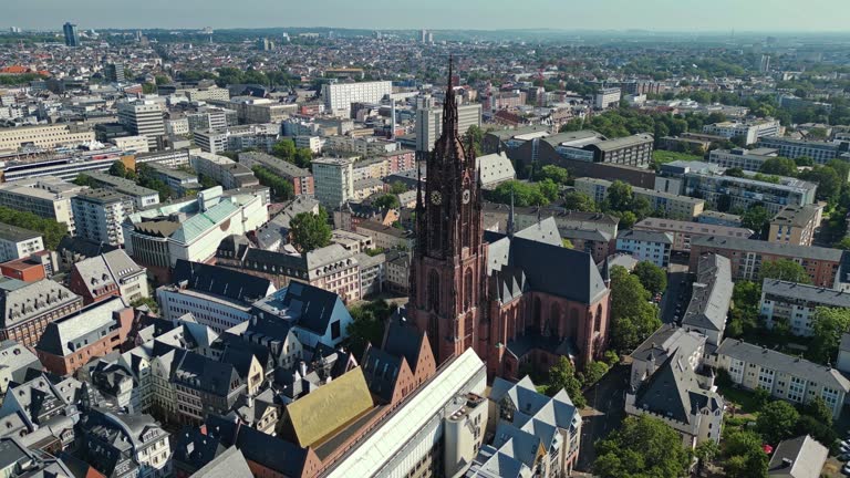 High above the city of Frankfurt the spire of the largest religious building