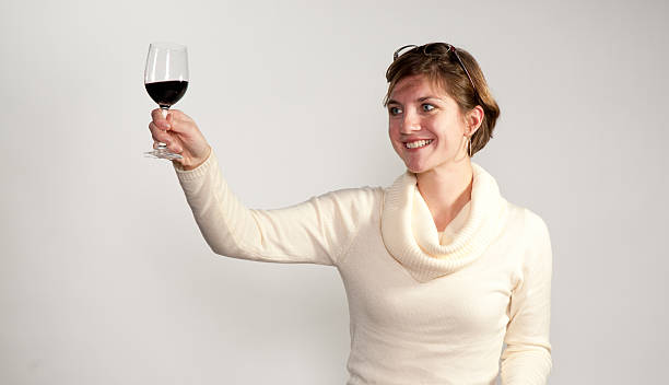 istock Smiling Woman Toasts Wine 177124109