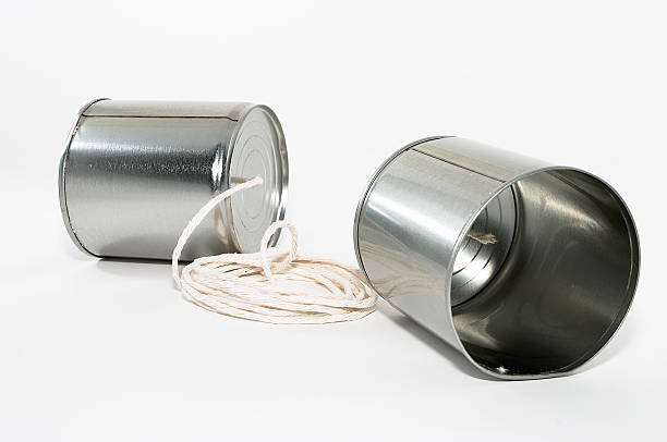 istock Tin can telephones, close up 177124475
