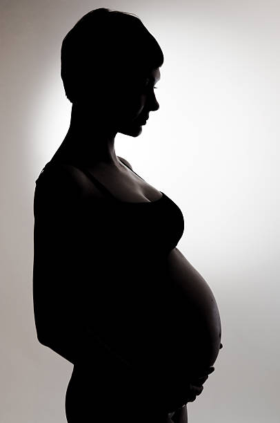 istock pregnant woman silhouette 177125143