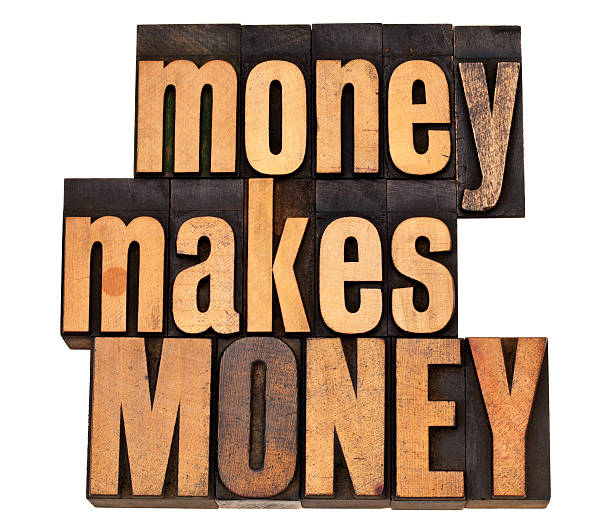 istock money concept in wood type 177125661