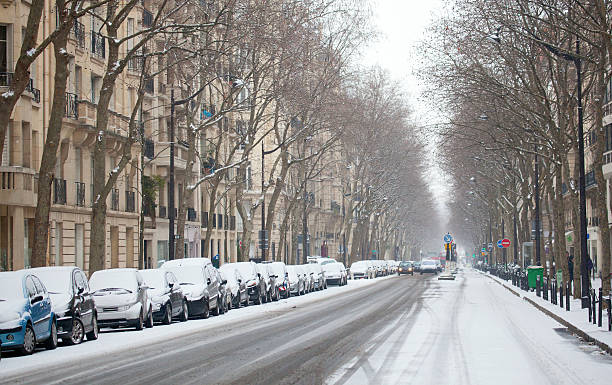 istock Winter in Paris. Parisian street covered with snow 177125792