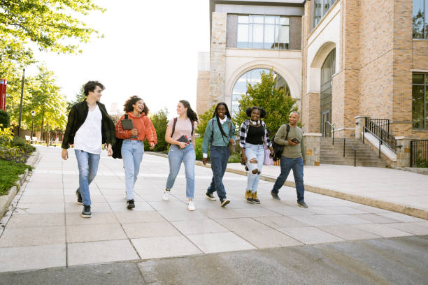 istock Group of diverse students arrive at University Campus 1771269804
