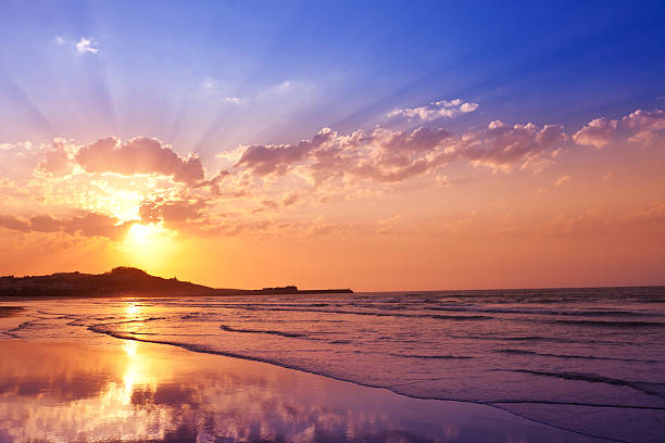 istock Nice sunset with lots of sunbeams at a lonely beach 177127031