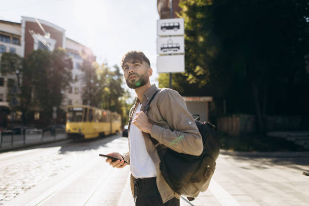 istock Man Waiting at Bus Station for Arrival 1771273526