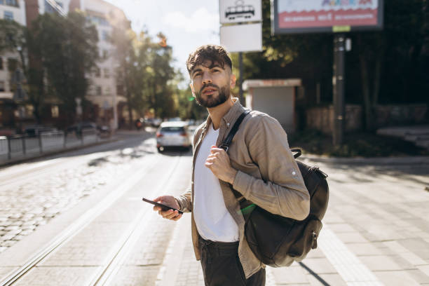 istock Man Waiting at Bus Station for Arrival 1771274051