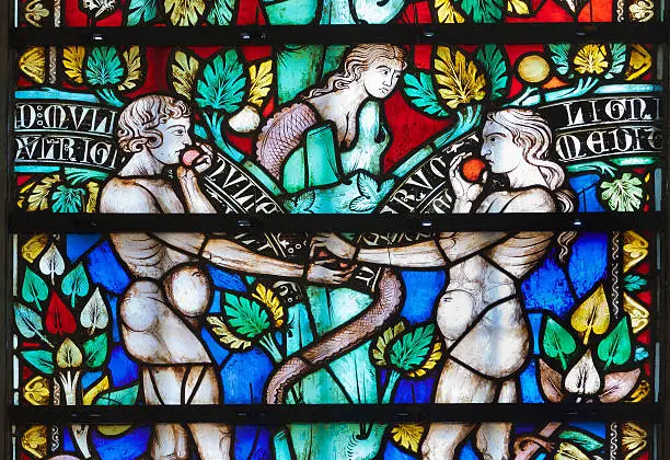 "Biblical scene of Adam and Eve in the Paradise (Cathedral of St. Michel.Carcassonne,France)"