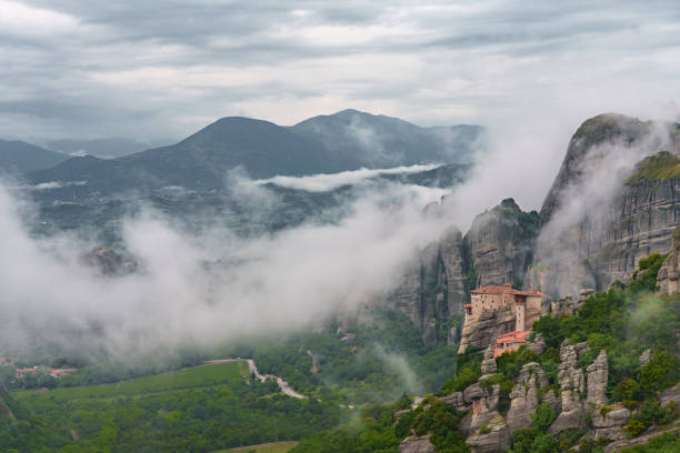 Landscape with monasteries and rock formations in Meteora, Greece.