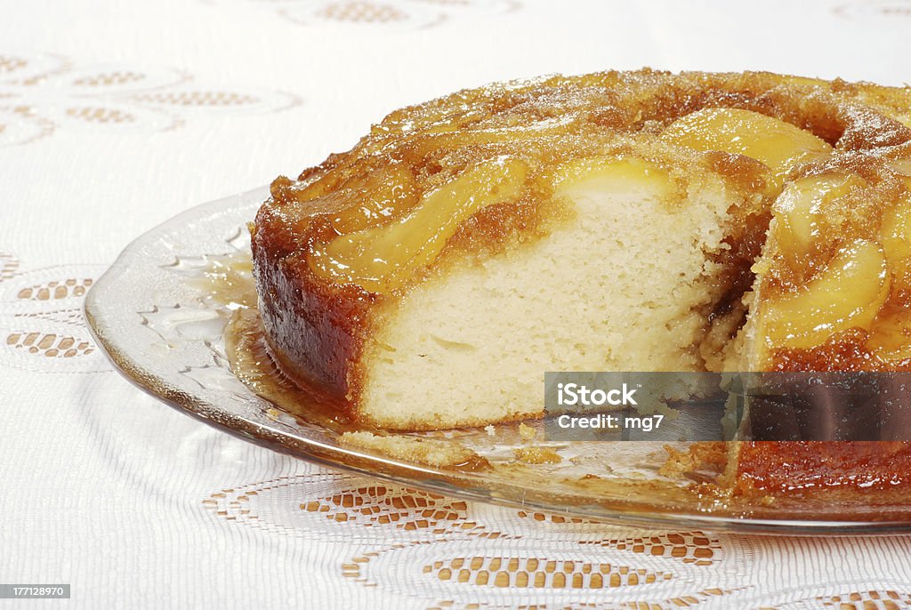 sliced upside down pear cake on glass plate closeup sliced upside down pear cake on glass plate Baked Stock Photo