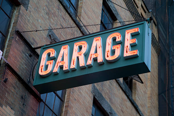 istock Fluorescent Garage Sign Outside Building 177129017