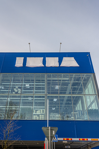 Mölndal, Sweden - March 12 2023: Exterior of large IKEA warehouse under construction.