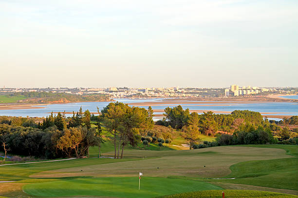 View golf course in the summer. With sand traps.