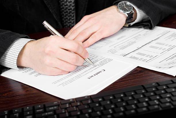 istock Business man filling out contract 177131759
