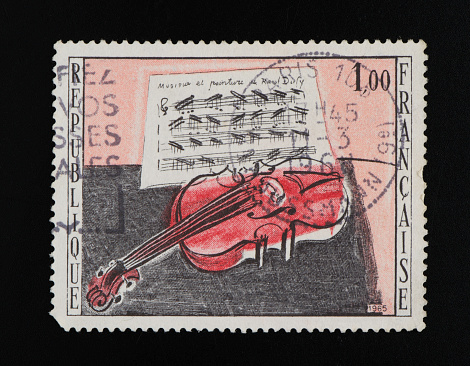 France Postage Stamp on black background. Studio Shot