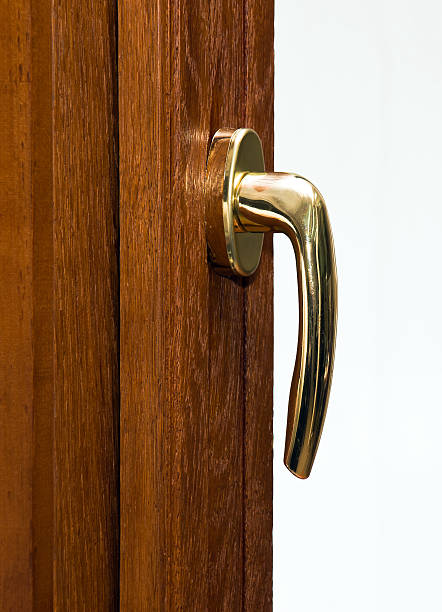 istock Gold handle on oak laminated fiberglass window 177132563