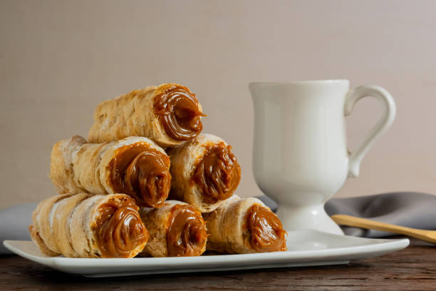 Typical Argentine food that is enjoyed at tea time. Dulce de leche cannons, typical Argentine food that is eaten at tea time. dulce de leche stock pictures, royalty-free photos & images