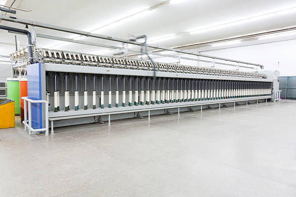 istock yarn spinning machine in textile factory 177132948