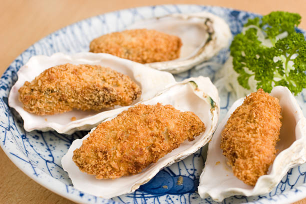 Japanese deep fried breadcrumbed oysters stock photo