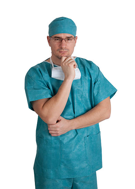 istock Doctor in scrubs thinking 177133966