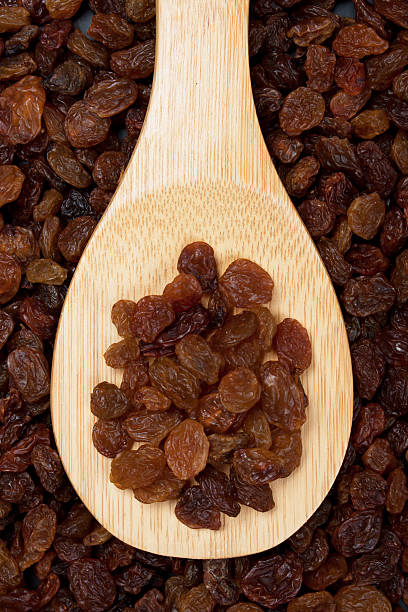 istock Raisins on wooden spoon 177134885