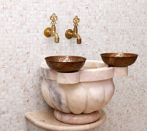 istock faucets and  copper bowl in turkish hamam 177135177