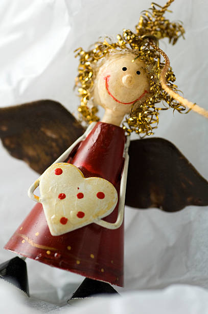 istock Christmas angel with heart 177135193