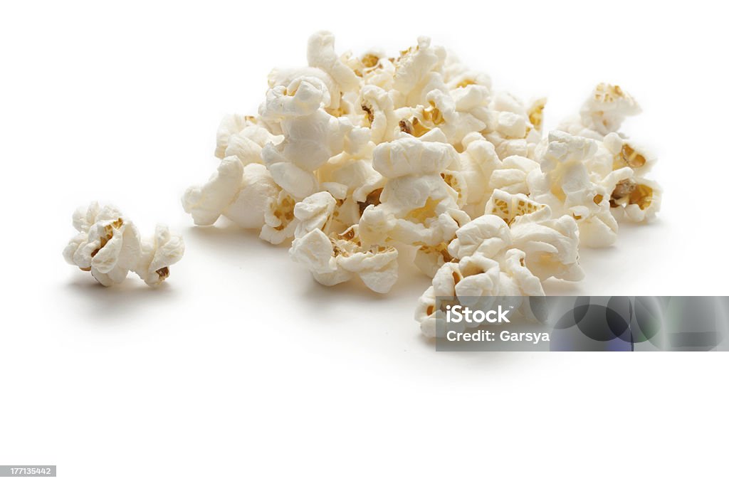 Popcorn on the white background Popcorn isolated on the white background Close-up Stock Photo