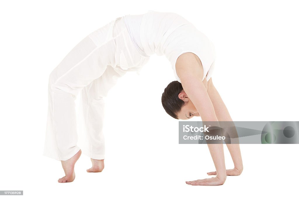 Young woman doing yoga exercise See other Yoga  images in lightbox Adult Stock Photo