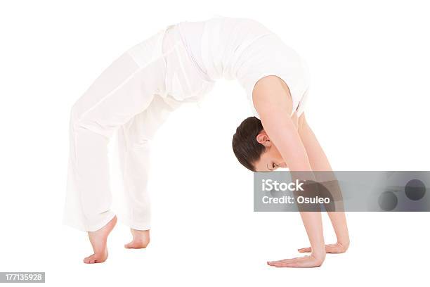 Young Woman Doing Yoga Exercise Stock Photo - Download Image Now - Adult, Adults Only, Aerobics
