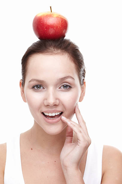 istock Young women with apple 177136261