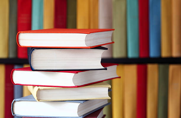 istock Stacked books and bookshelves 177136542