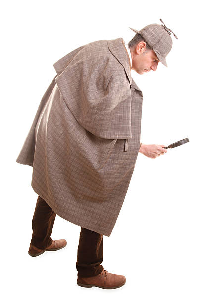 This detective is investigating with magnifying glass.