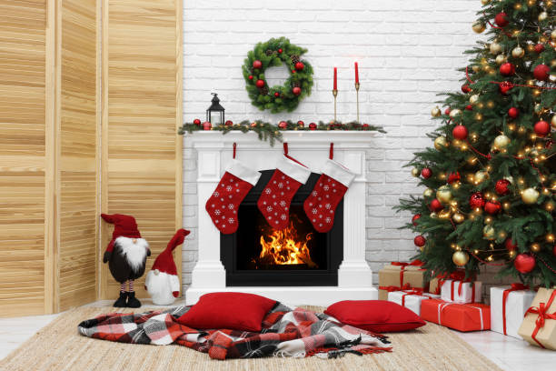 istock Cosy room with tree and fireplace decorated for Christmas. Interior design 1771367243