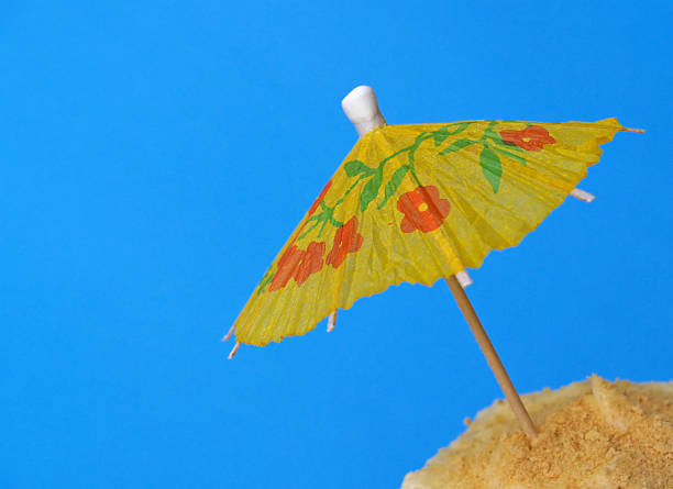 istock luau party cupcake with umbrella 177136825