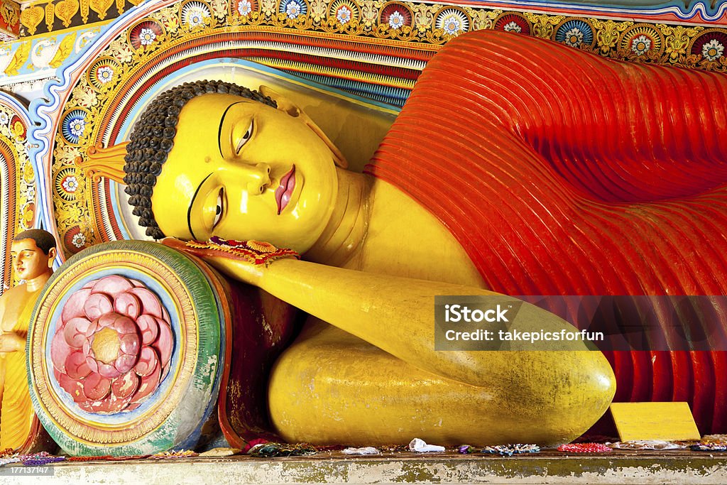 reclining buddha in isurumuniya temple, anuradhapura, sri lanka the reclining buddha in in the cave at isurumuniya temple, anuradhapura, sri lanka Antiquities Stock Photo