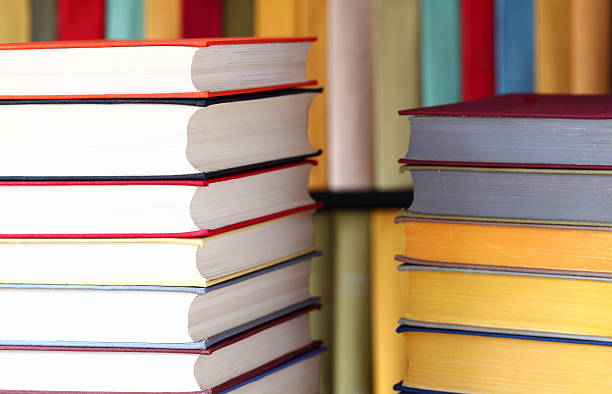 istock Stacked books and bookshelves 177137447