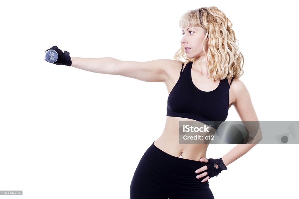 woman during fitness time beautiful woman during fitness time with dumbbell - isolated Abdomen Stock Photo