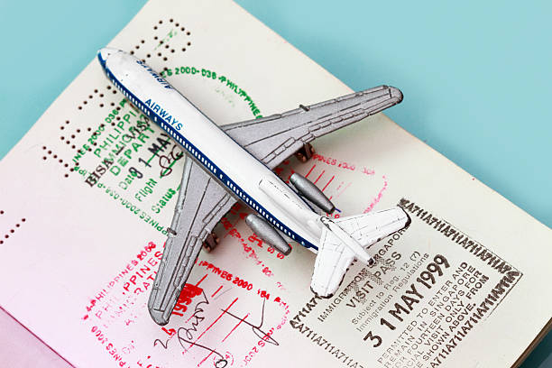 istock Toy plane on passport 177138136