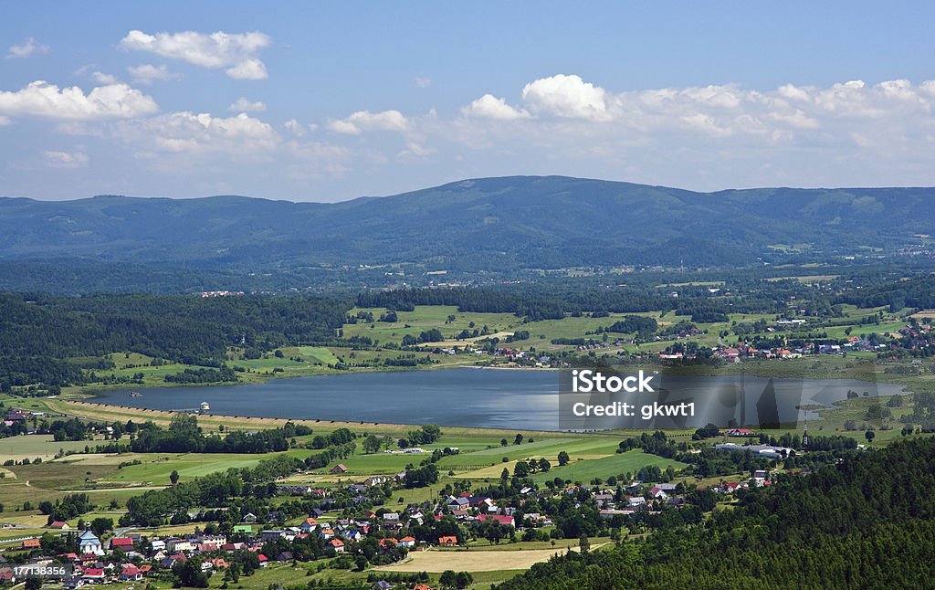 View of Karkonosze Mountains View of Karkonosze Mountains with a town - Jelenia Gora and Sosnowka reservoir Jelenia Góra - Silesia Stock Photo