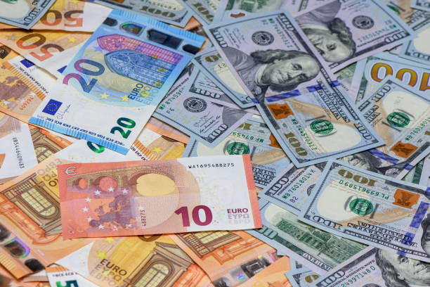 istock background of euros and dollars on the table, studio shooting 10 1771386224