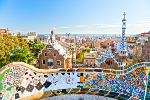 Cityscape view from from the terrace in Guell Park on a sunny afternoon, Barcelona, Spain