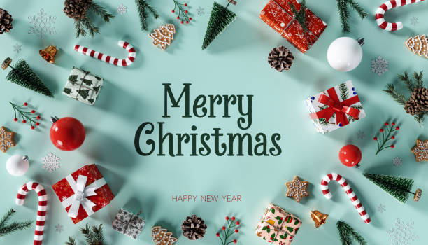 istock Christmas decoration with gift box and Merry Christmas text on turquoise blue background. 1771386849