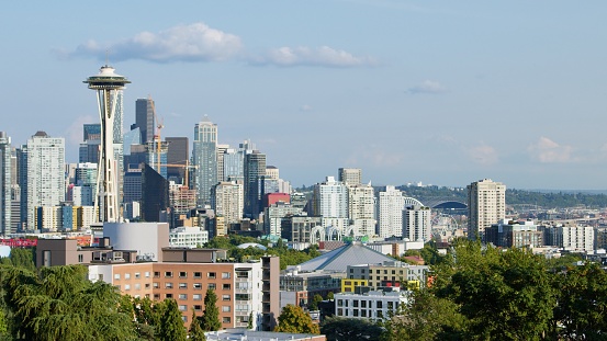 Seattle, Washington, USA downtown skyline at night with Mt. Rainier.